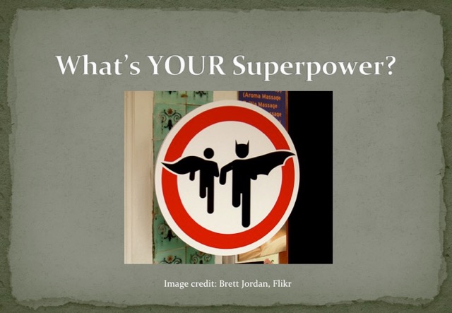 A road sign with Batman and Robin stick people on it. Above the image, on a grey background, are the words 'What's your superpower?'