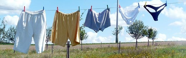 Different kinds of underwear hanging on a washing line