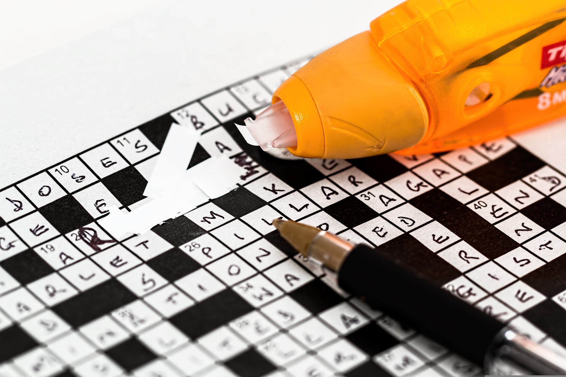 A crossword being filled in